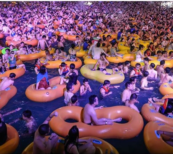 China Defends Wuhan Pool Party After Global Outrage